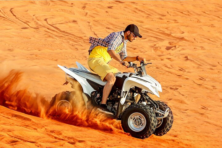 Dubai Desert Safari & BBQ Dinner + 1 hour Single Quad Bike Ride