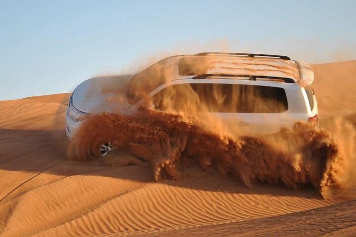 Dubai Desert Safari with BBQ dinner and camel ride