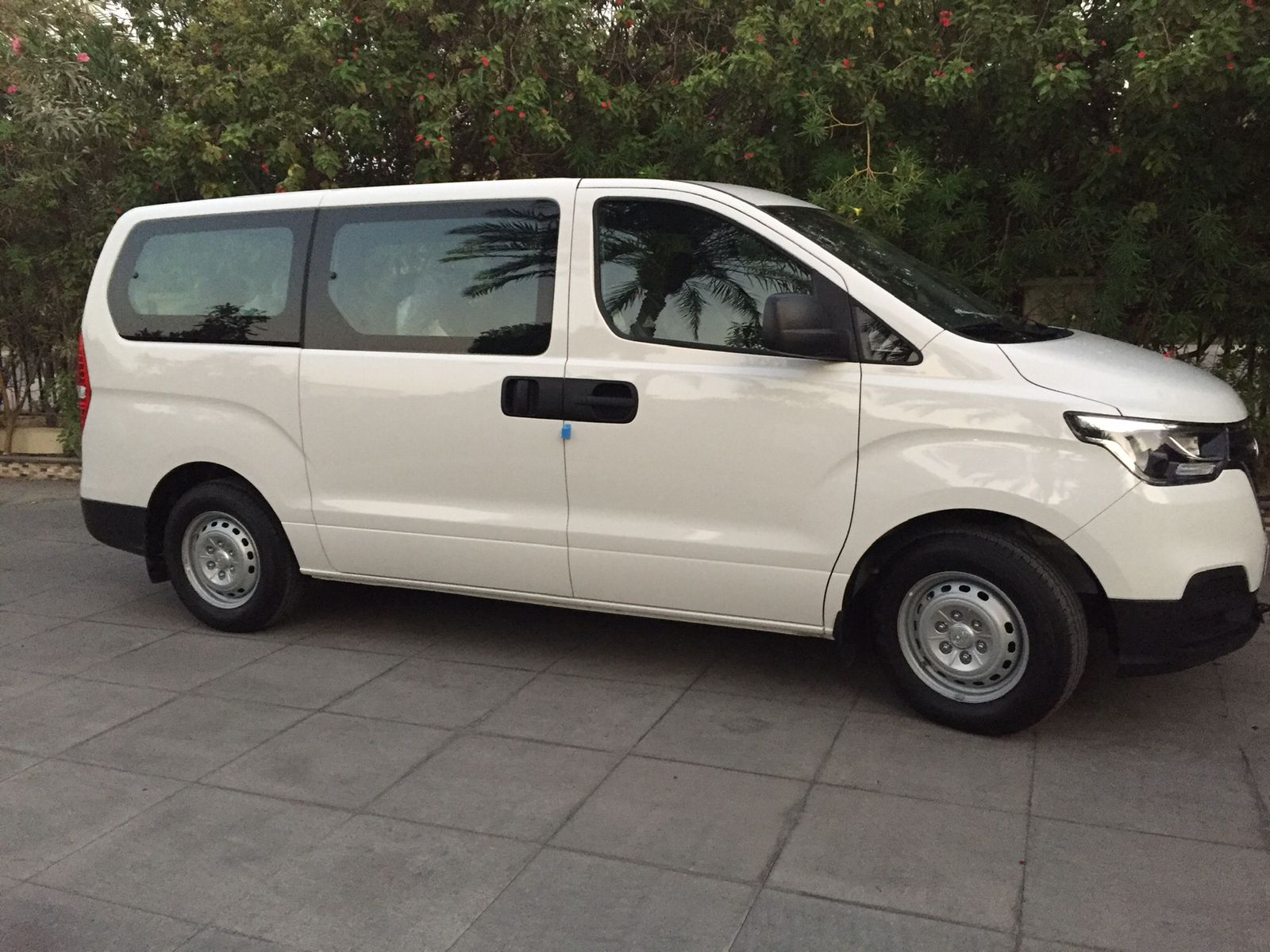 Private Van hire with driver for 10 hours in Abu Dhabi