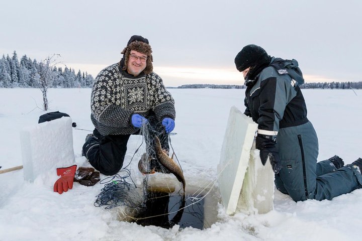 Ice Fishing by Snowmobile from Levi, Finland Ice Fishing by Snowmobile from Levi, Finland