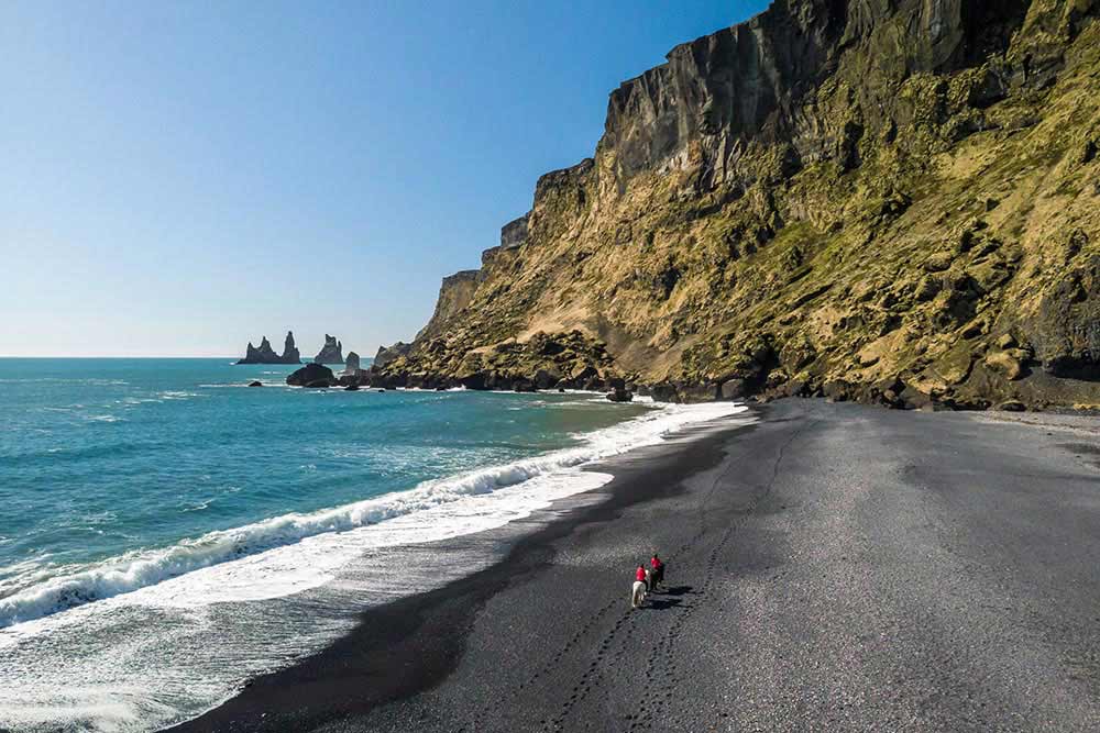 South Coast Waterfalls & Black Beach Horse Riding South Coast Waterfalls & Black Beach Horse Riding