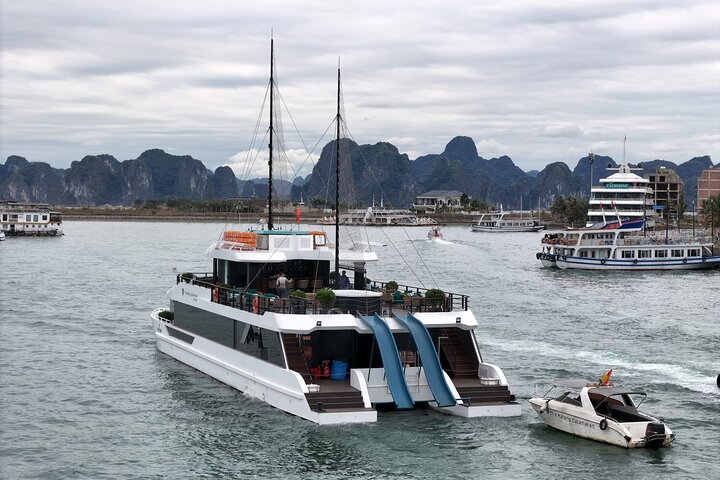 THE HALONG CATAMARAN - Premium Day Cruise on Bay with Water Slide THE HALONG CATAMARAN – Premium Day Cruise on Bay with Water Slide